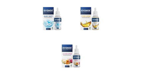 Evonox Clean kurutma topu esansı şişeleri Baby Soft, Pure Musk ve Lilium Lotus, yün kurutma toplarının yanında